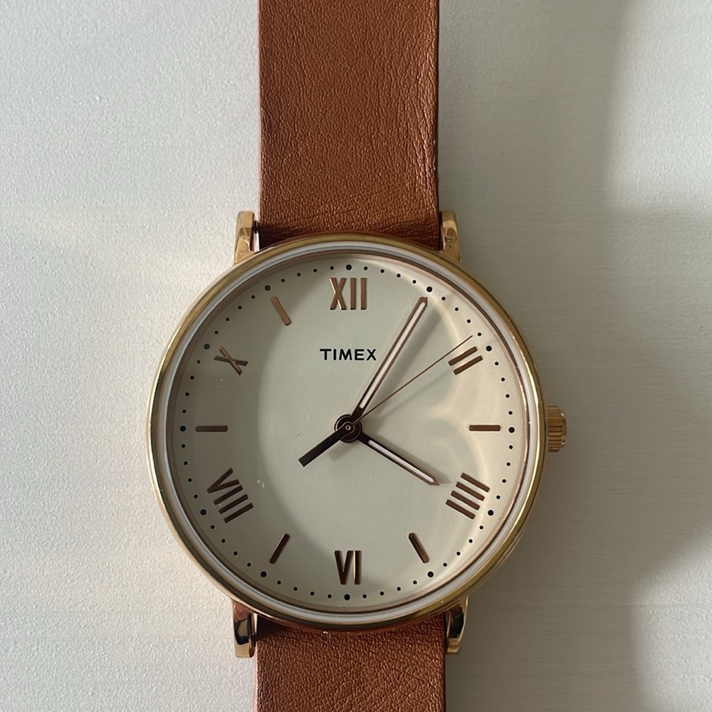 Timex rose gold and leather watch.